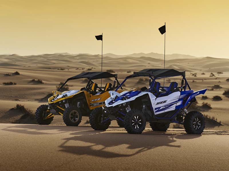 YXZ1000R Racing Blue as depicted is equipped with genuine Yamaha accessories.